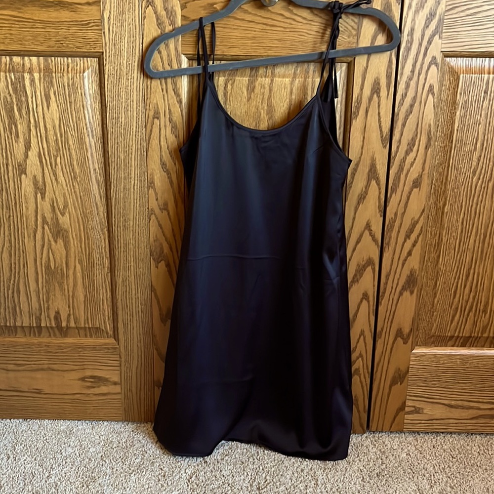 Urban Outfitter’s slip dress in black. New with tags!